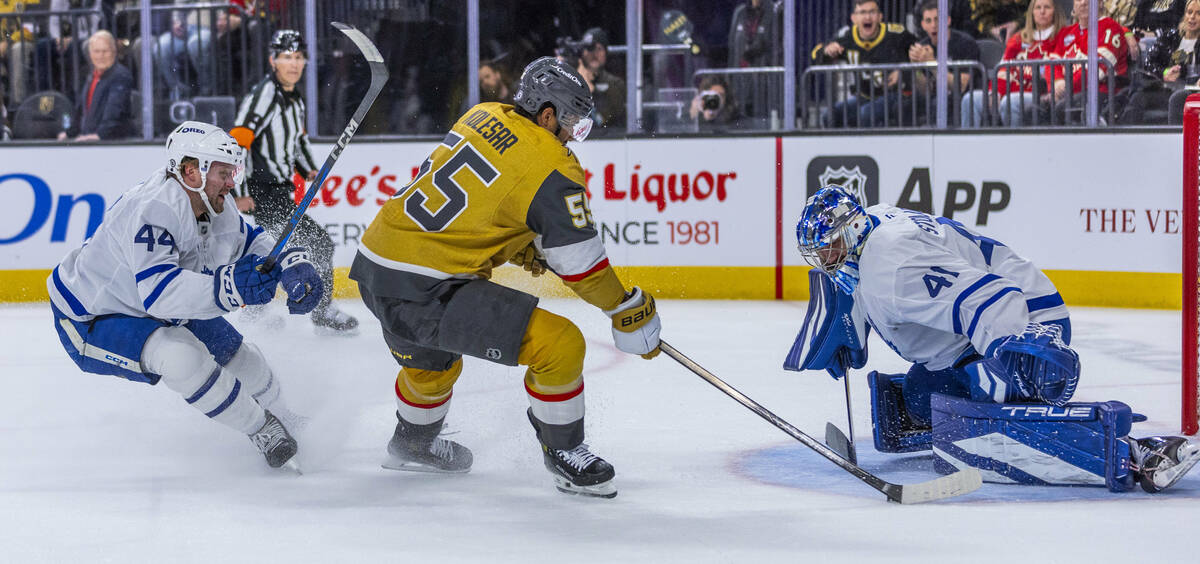 Golden Knights right wing Keegan Kolesar (55) shoots against Toronto Maple Leafs goaltender Jos ...
