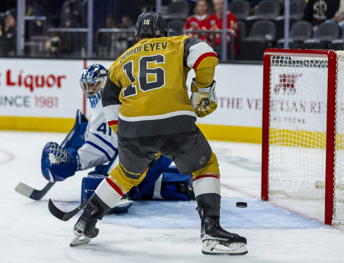 Golden Knights left wing Pavel Dorofeyev (16) looks to deflect a pass into the net past Toronto ...