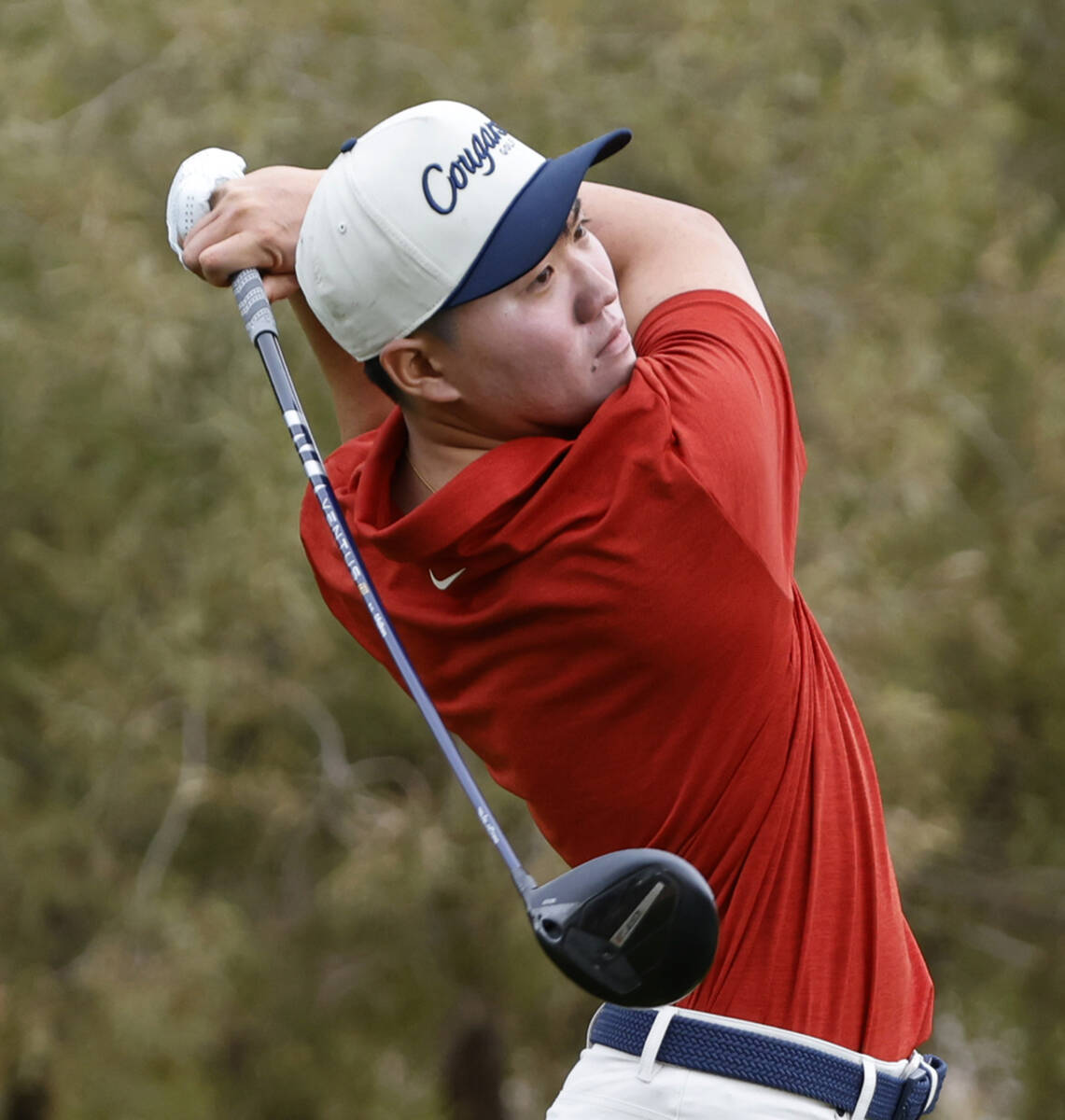 Coronado's Anderson Lee watches his drive as he tees off on the tenth during Class 5A boys golf ...