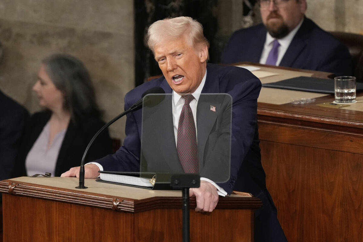 President Donald Trump addresses a joint session of Congress at the Capitol in Washington, Tues ...