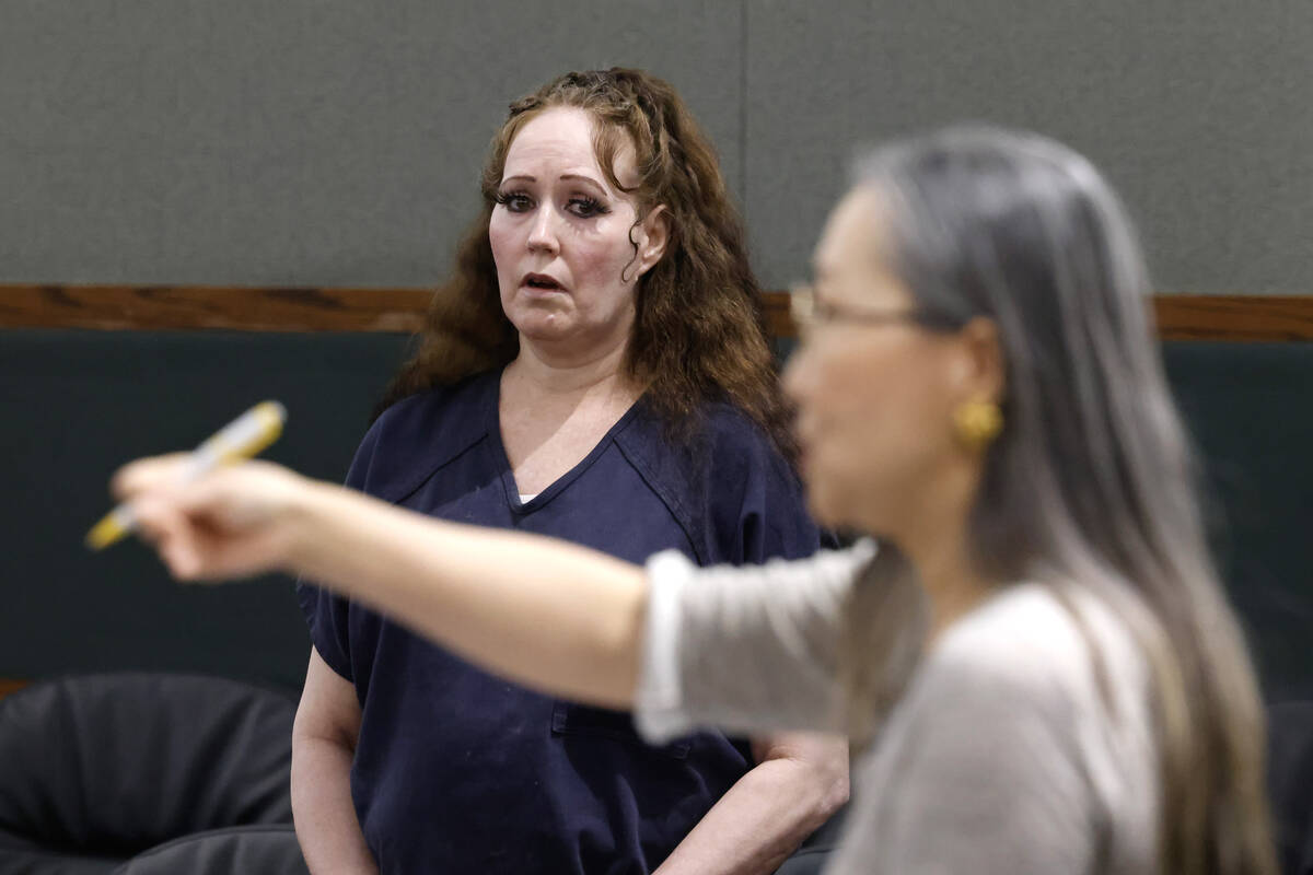 Tedra Holder, left, who pleaded guilty to killing a man and grand larceny auto, listens as her ...