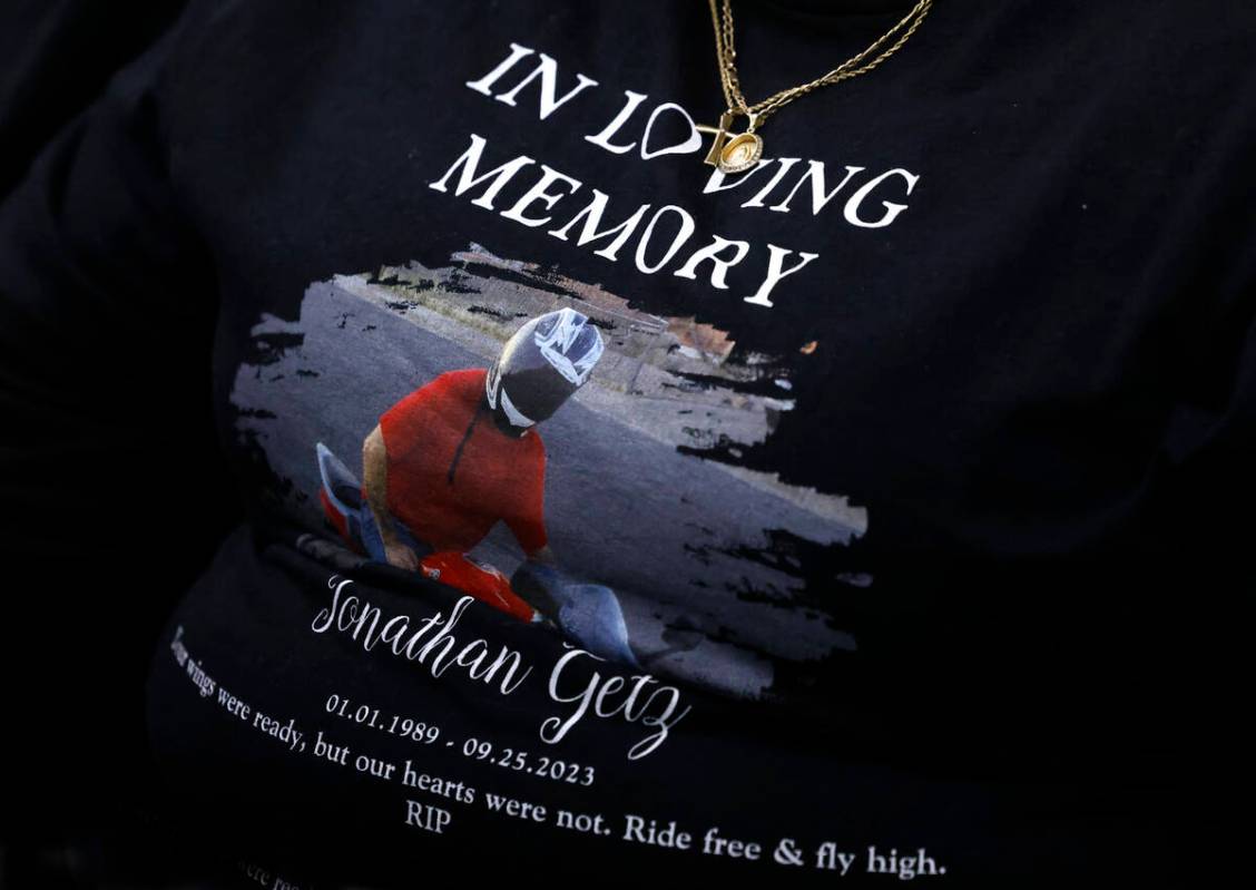 Samantha Potts, a friend of a shooting victim Jonathan Getz, wearing a shirt with a photo of Ga ...