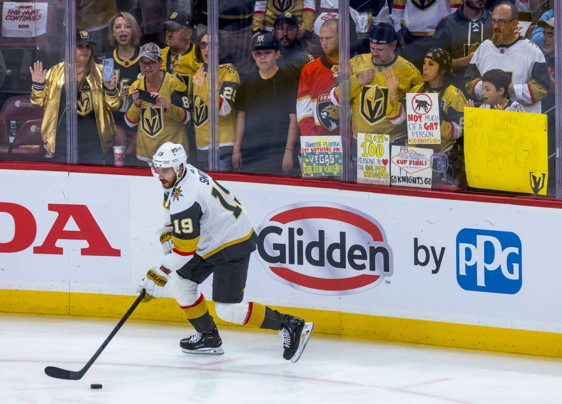 Golden Knights right wing Reilly Smith (19) skates by as fans look on during warm ups before Ga ...