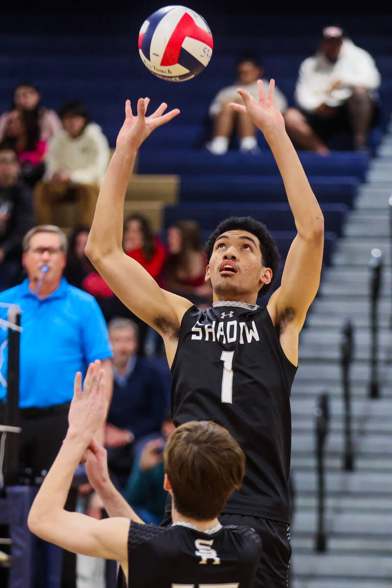 Shadow Ridge setter Kingston Jerome bumps the ball during a high school boys volleyball game be ...