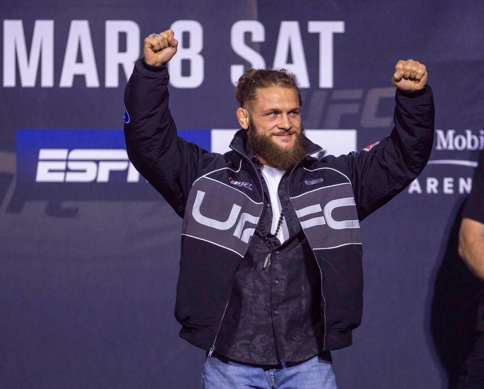 Lightweight fighter Rafael Fiziev arrives on stage during the UFC 313 press conference at the M ...