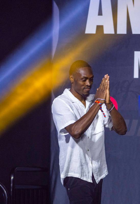 Lightweight fighter Jalin Turner arrives on stage during the UFC 313 press conference at the Mi ...