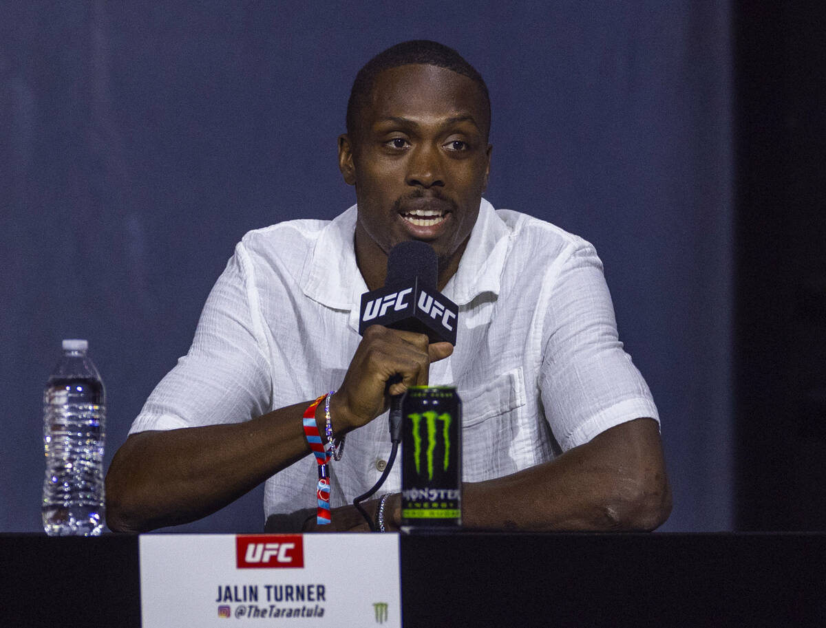 Lightweight fighter Jalin Turner answers a question during the UFC 313 press conference at the ...