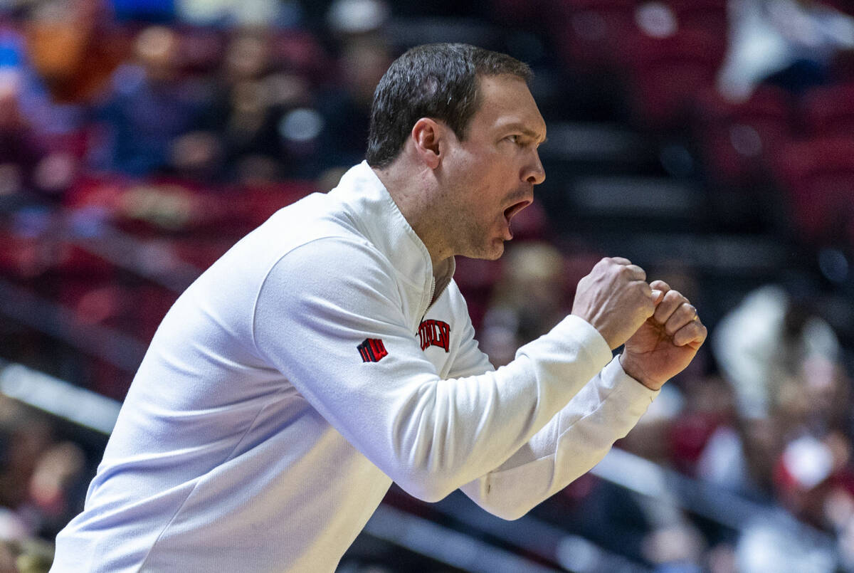 UNLV head coach Kevin Kruger is pumped after an early score against the San Diego State Aztecs ...