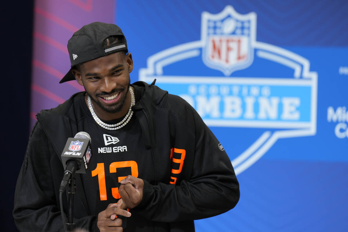Colorado quarterback Shedeur Sanders speaks during a press conference at the NFL football scout ...