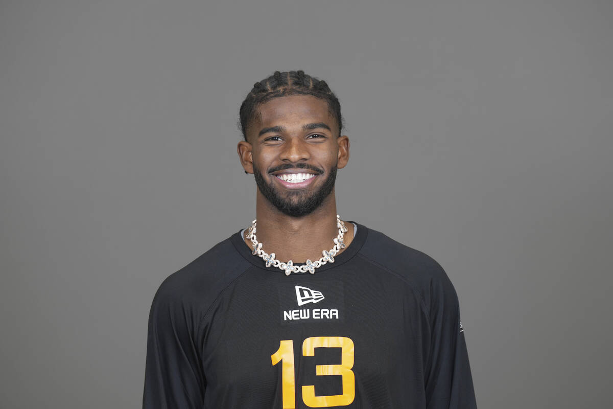 Colorado quarterback Shedeur Sanders (QB13) poses for a portrait at the NFL football Combine on ...