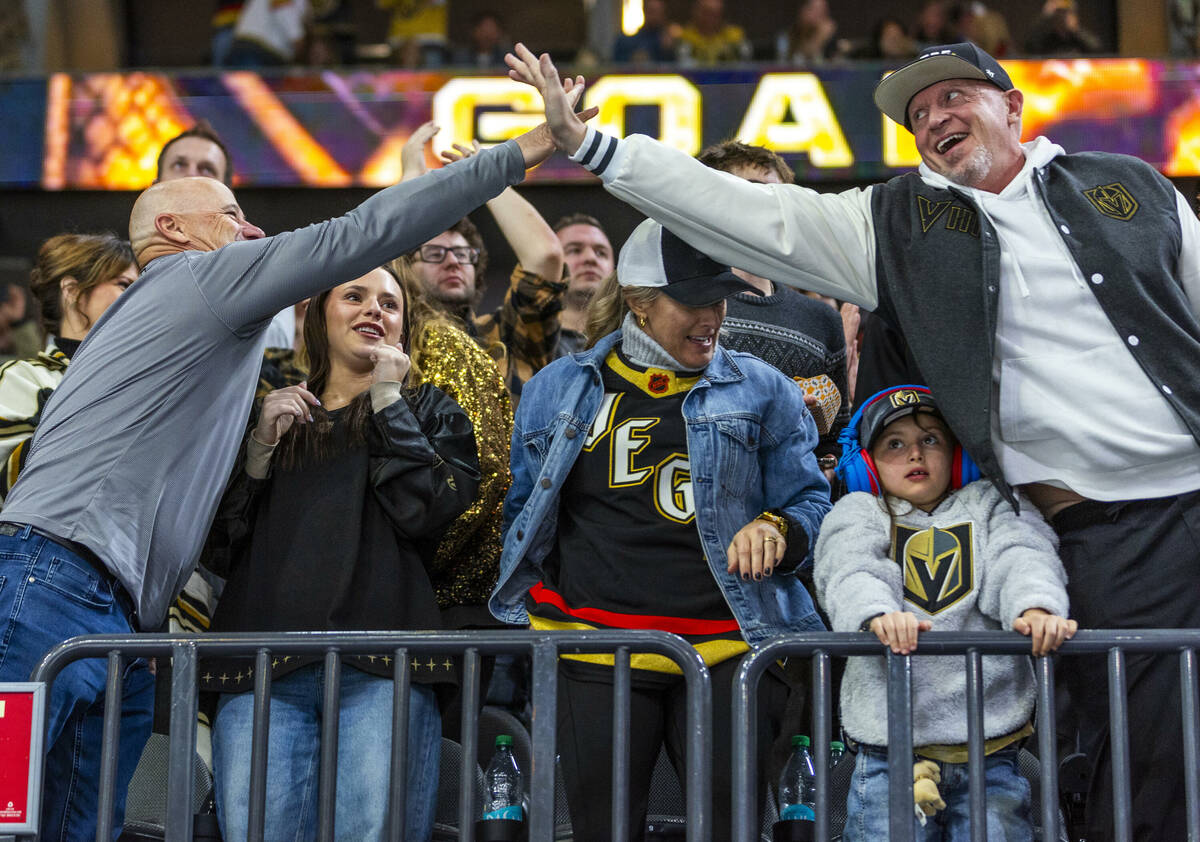 Golden Knights fans celebrate a score against the Pittsburgh Penguins during the second period ...