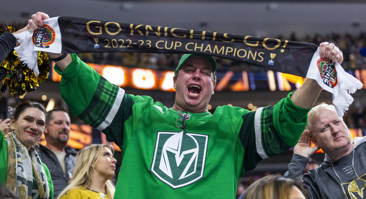 Golden Knights fans celebrate a score against the Pittsburgh Penguins during the second period ...