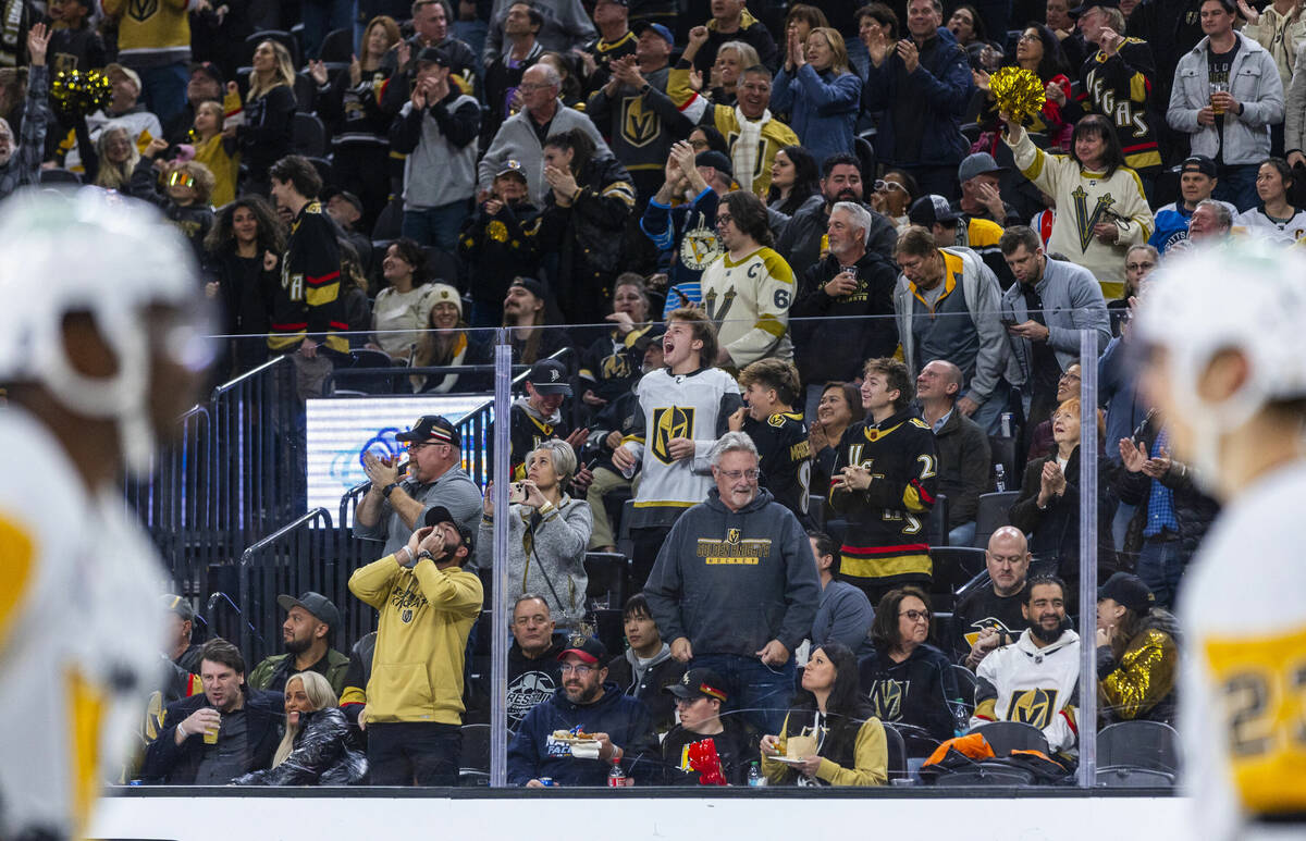 Golden Knights fans celebrate another score against the Pittsburgh Penguins during the third pe ...