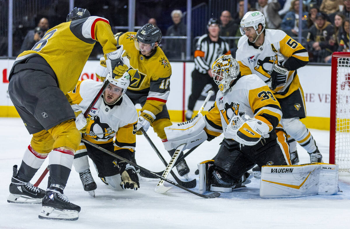 Golden Knights center Tomas Hertl (48) looks to shoot against Pittsburgh Penguins goaltender Al ...