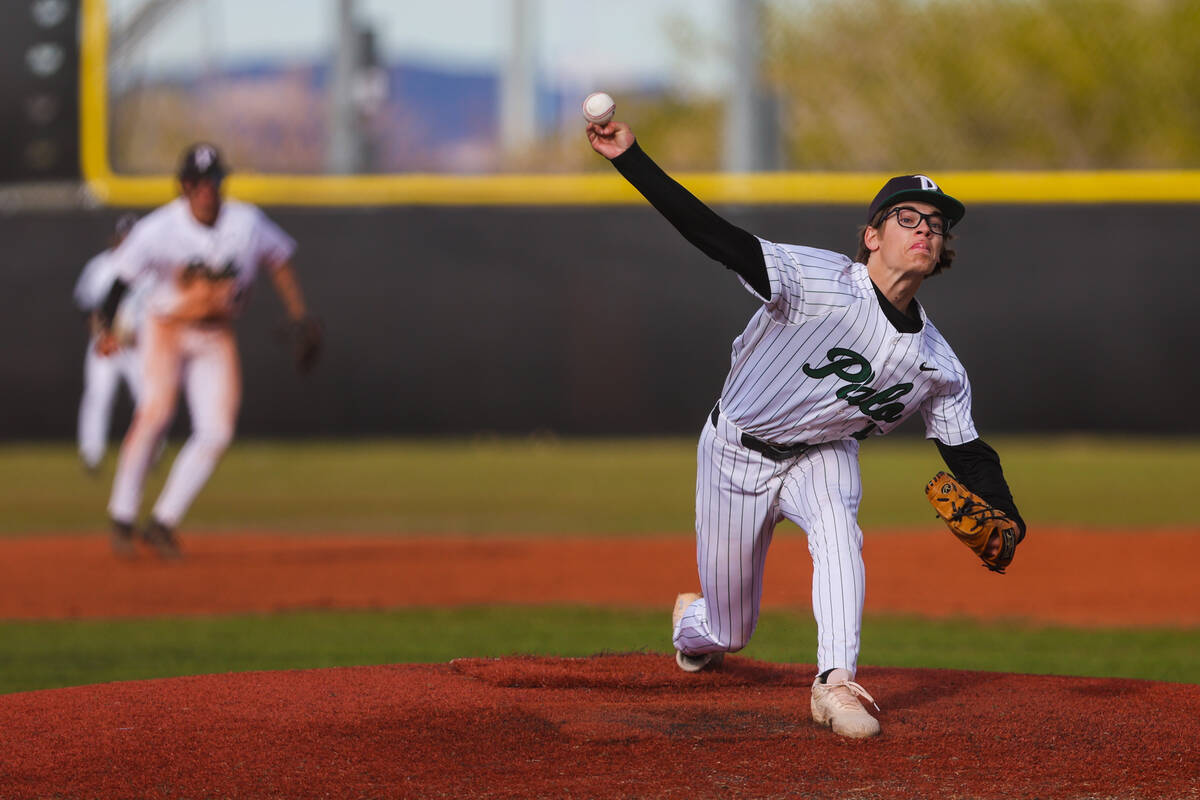 Palo Verde pitcher Dylan Feely pitches the ball during a high school baseball game between Basi ...