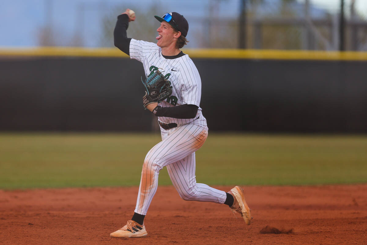 Palo Verde pitcher Kyle Johnson practices throwing between innings during a high school basebal ...