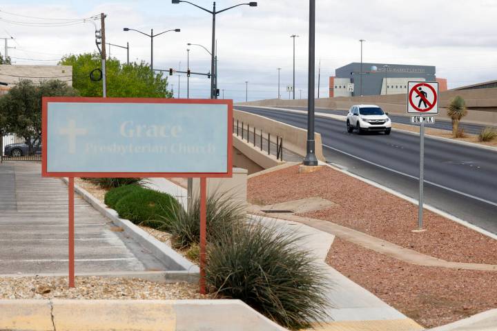 A motorist navigates on the elevated Martin Luther King Boulevard next to Grace Presbyterian Ch ...