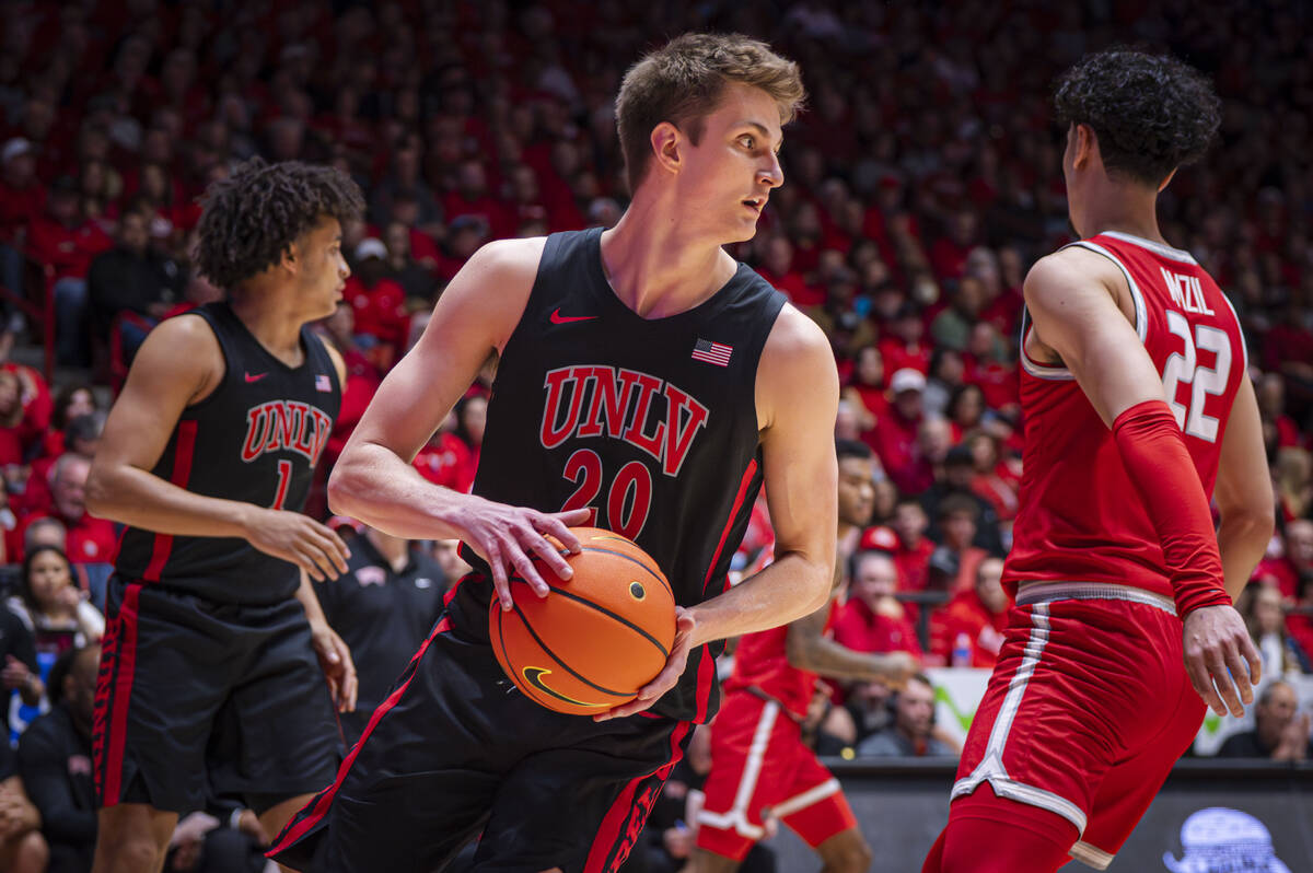 UNLV guard Julian Rishwain (20) heads down the court at The Pit in Albuquerque, N.M., on Friday ...