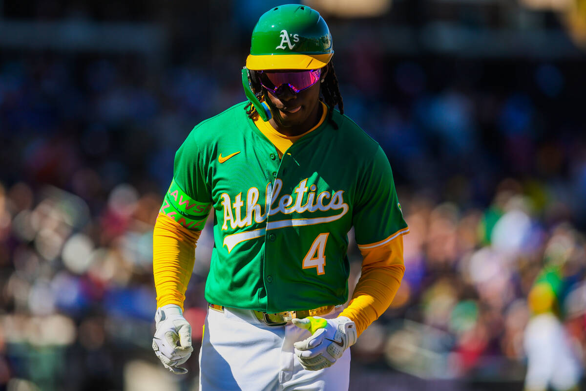 Athletics outfielder Lawrence Butler (4) walks back to the dugout during Big League Weekend bas ...