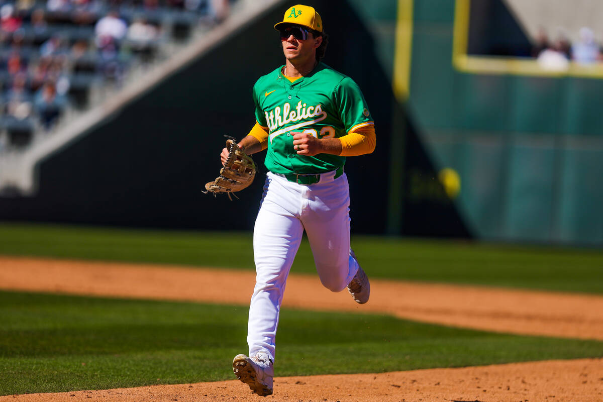 Athletics outfielder Colby Thomas (32) runs back to the dugout during a Big League Weekend base ...