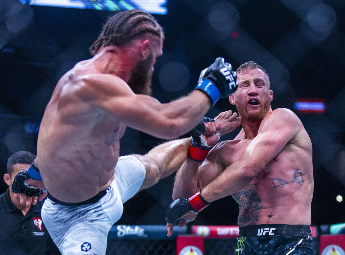 Rafael Fiziev sends a kick at Justin Gaethje catching him in the neck during their lightweight ...
