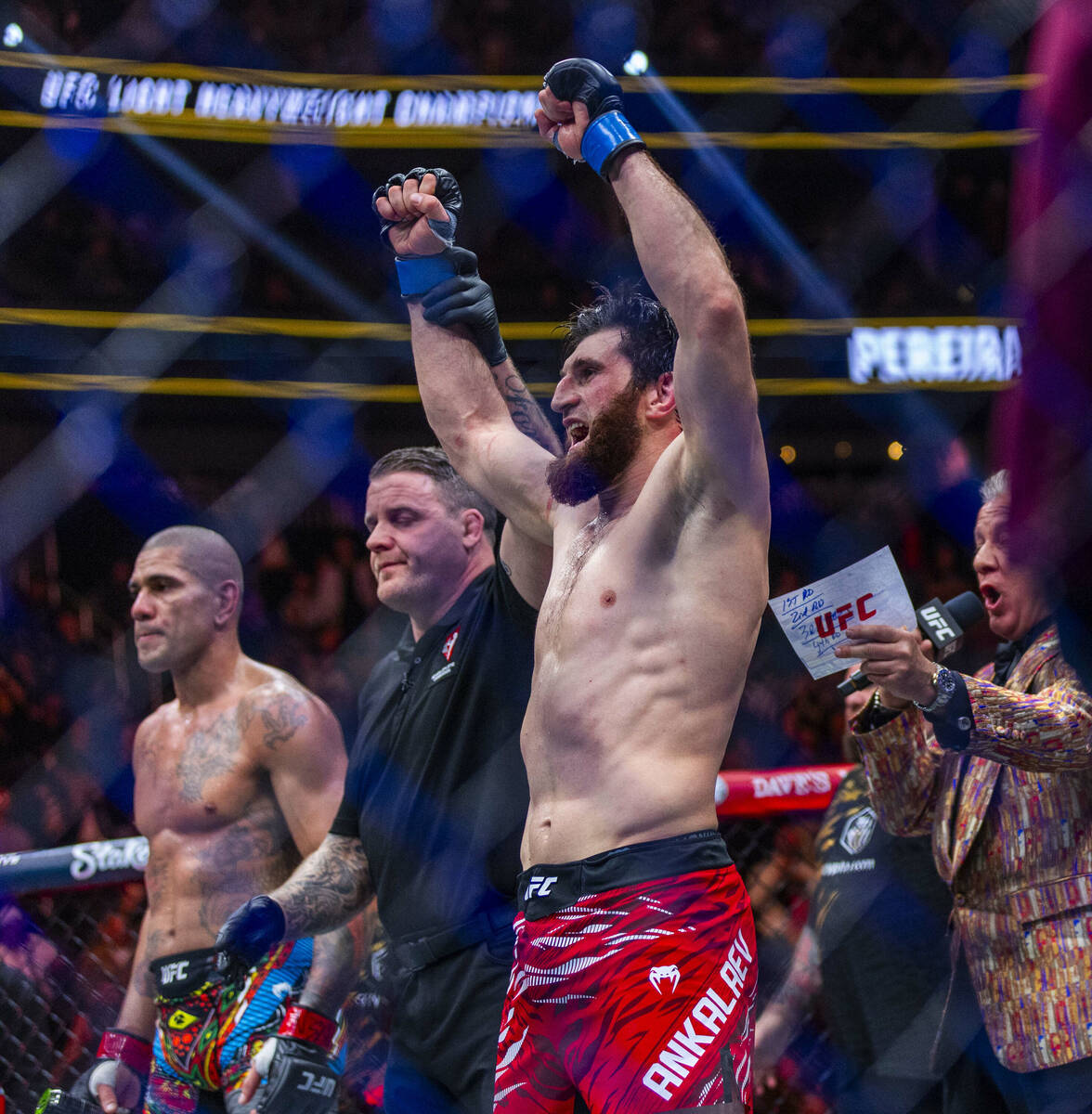 Magomed Ankalaev gets the decision and the belt after defeating Alex Pereira in their light hea ...
