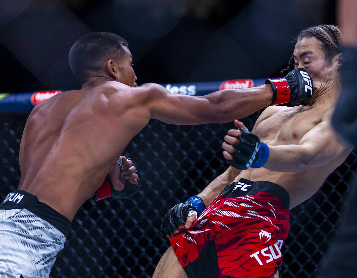 Joshua Van connects with the face of Rei Tsuruya during their flyweight fight in UFC 313 at the ...