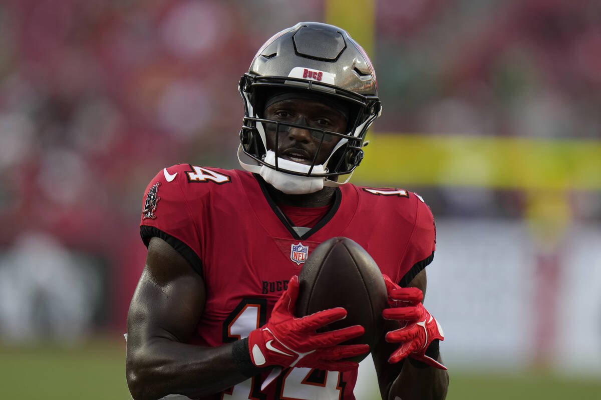 Tampa Bay Buccaneers' Chris Godwin warms up before an NFL football game against the Philadelphi ...