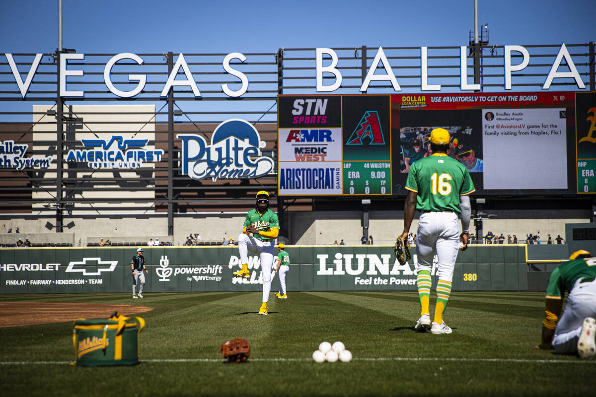 Athletics outfielder Lawrence Butler (4) warms up before a Big League Weekend baseball game aga ...