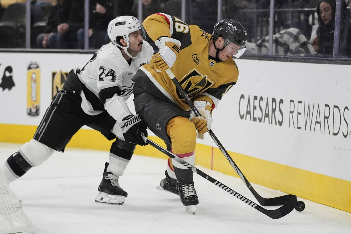 Vegas Golden Knights left wing Pavel Dorofeyev (16) and Los Angeles Kings center Phillip Danaul ...