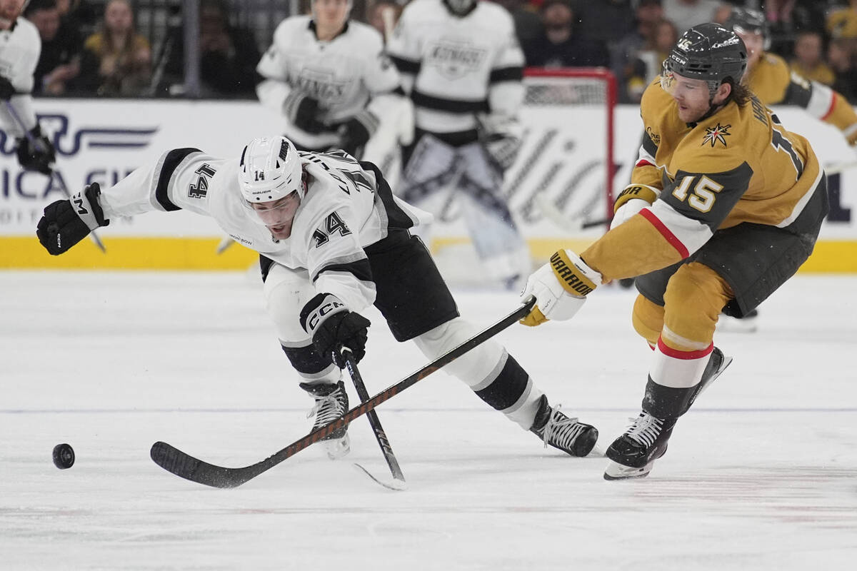 Los Angeles Kings right wing Alex Laferriere (14) and Vegas Golden Knights defenseman Noah Hani ...