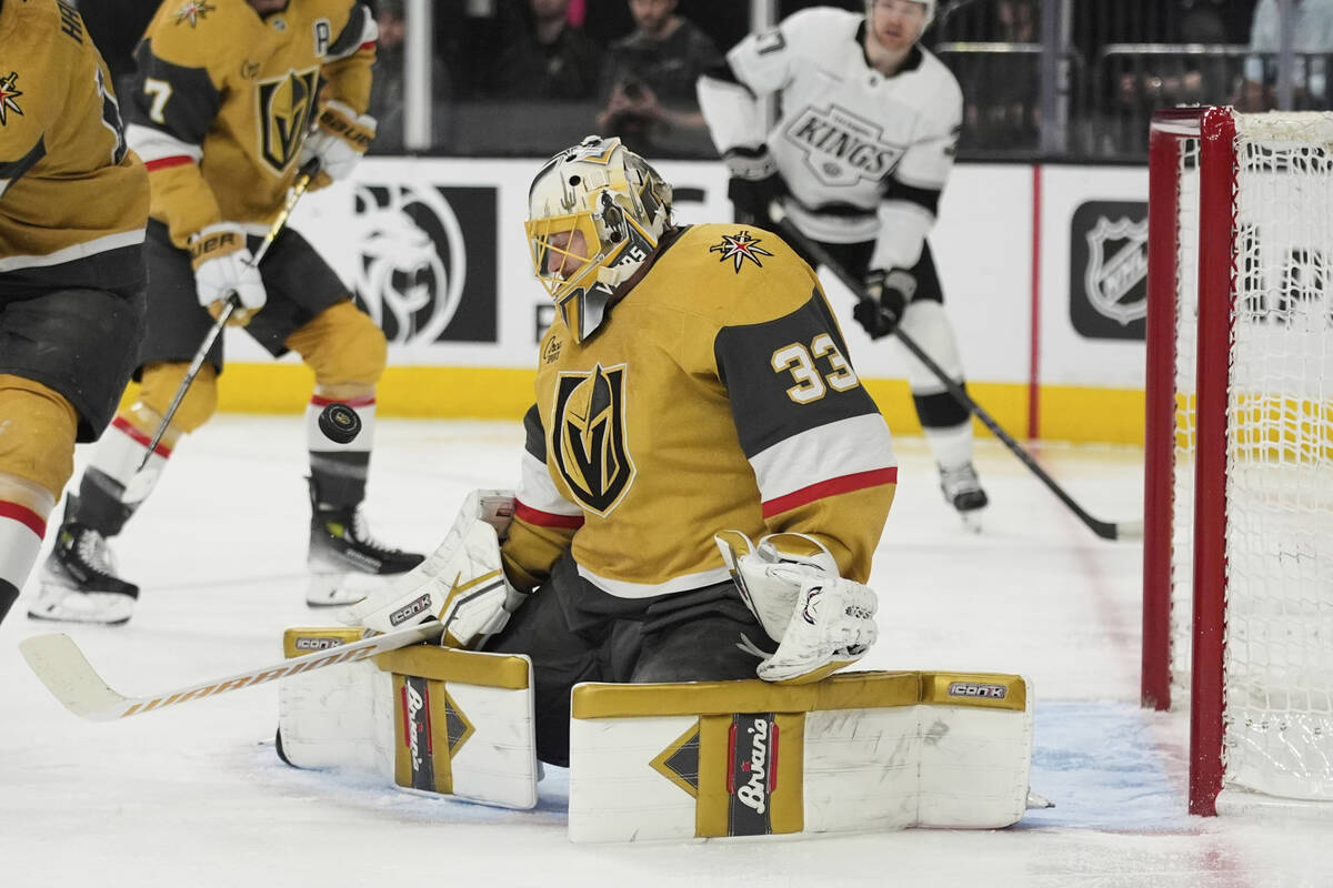 Vegas Golden Knights goaltender Adin Hill (33) blocks a shot by the Los Angeles Kings during th ...