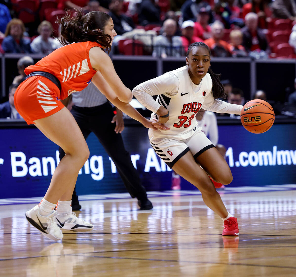UNLV Lady Rebels guard Amarachi Kimpson (33) drives in front of Boise State Broncos forward Lib ...