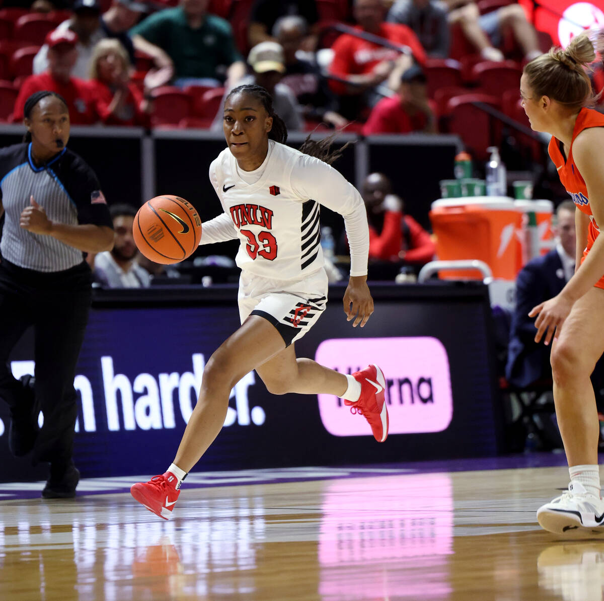 UNLV Lady Rebels guard Amarachi Kimpson (33) drives the ball against the Boise State Broncos in ...