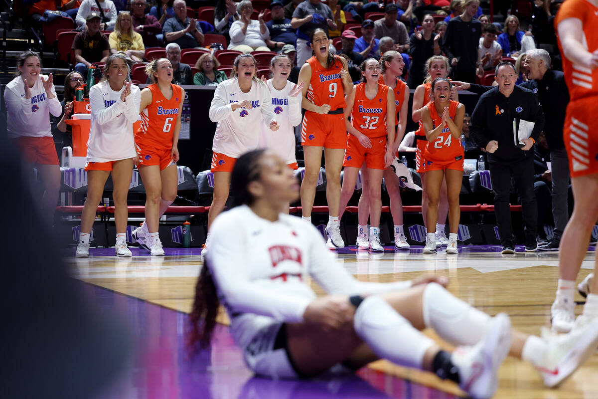Boise State Broncos players cheer as their team takes on the UNLV Lady Rebels in the first half ...