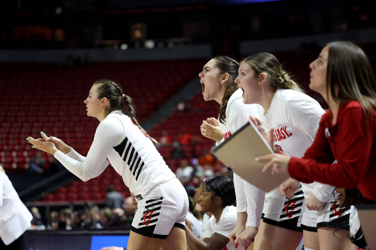 UNLV Lady Rebels players cheer their team as they take on the Boise State Broncos in the second ...