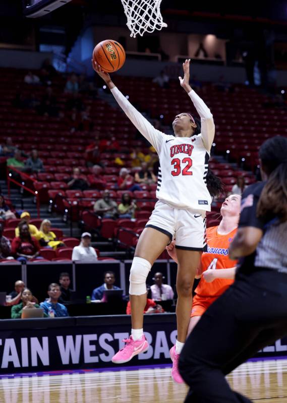 UNLV Lady Rebels forward Meadow Roland (32) shoots in front of Boise State Broncos guard Dani B ...