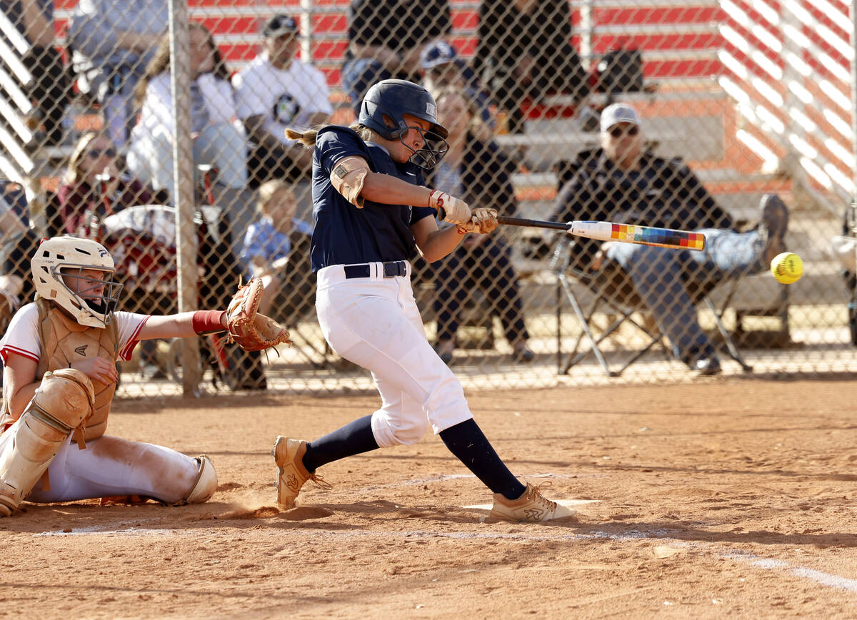 Shadow Ridge shortstop Aleana Aionaaka (5) makes contact against Arbor View during a softball g ...