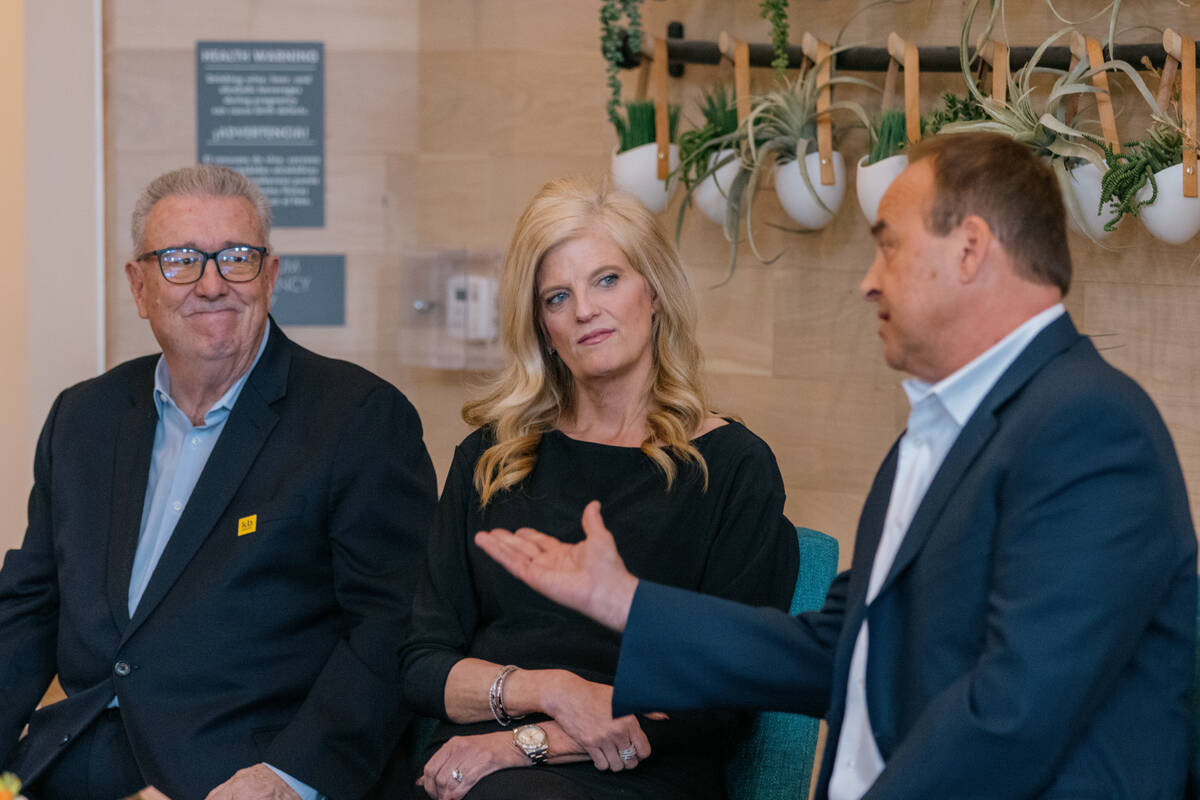 From left, John McLaury, vice president of KB Home; Nicole Bloom, division president of Richmon ...