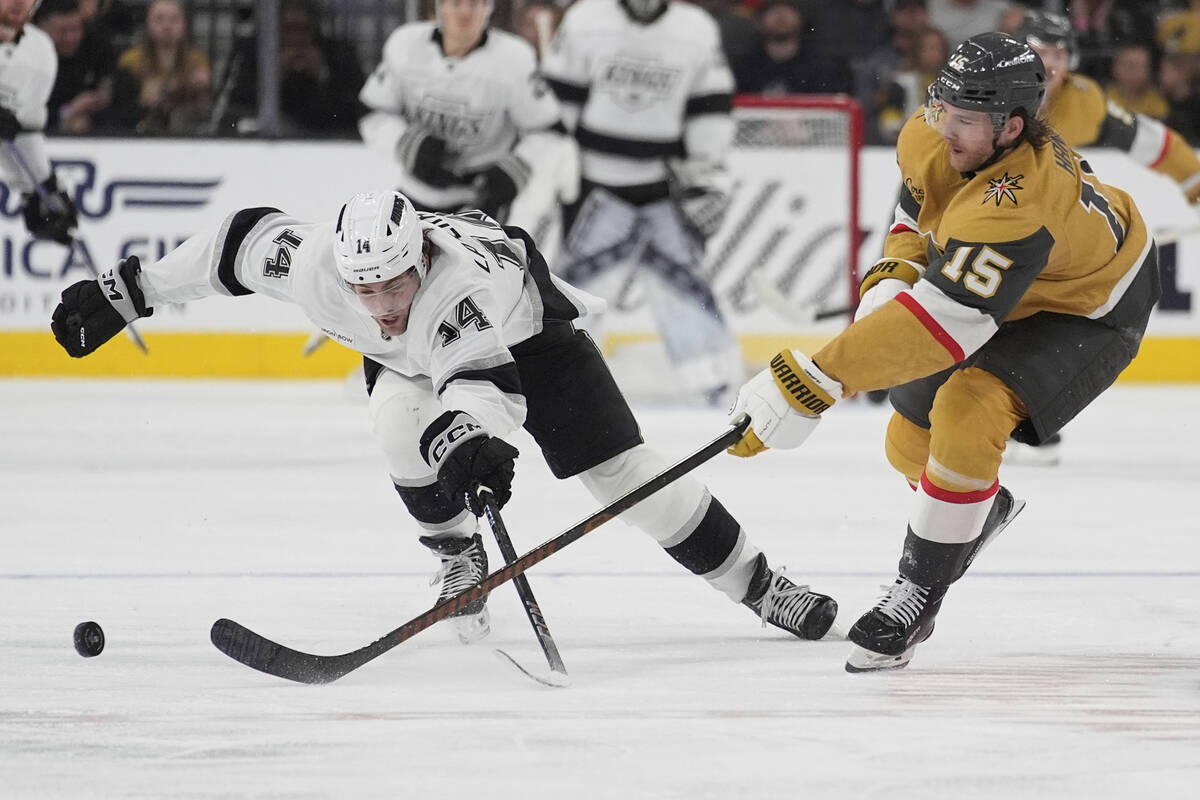Los Angeles Kings right wing Alex Laferriere (14) and Vegas Golden Knights defenseman Noah Hani ...