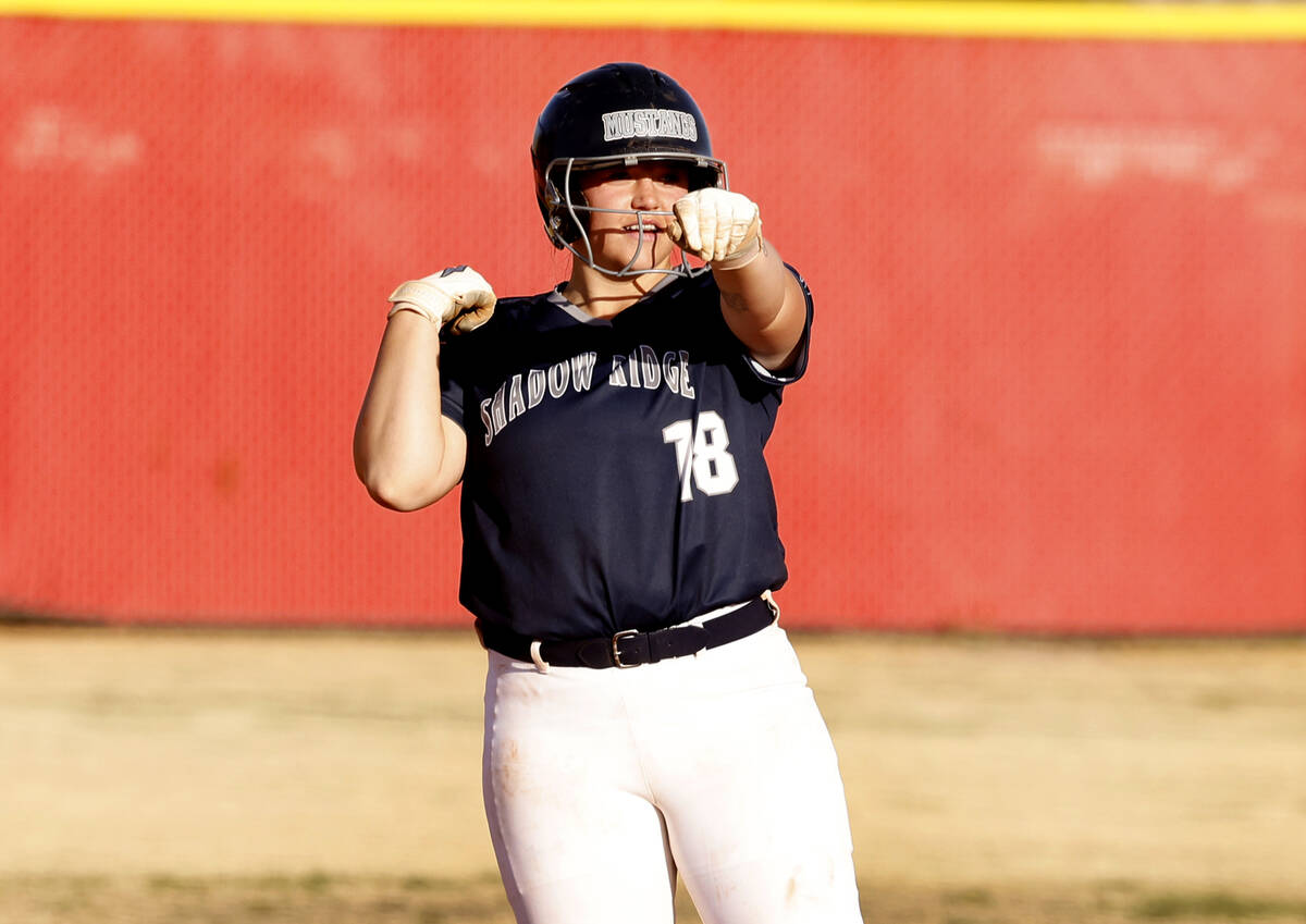 Shadow Ridge Madison Foster (18) reacts after hitting two RBI and a double against Arbor View d ...