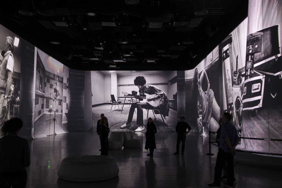 People take in a preview of “Rolling Stone Presents: Amplified, The Immersive Rock Exper ...