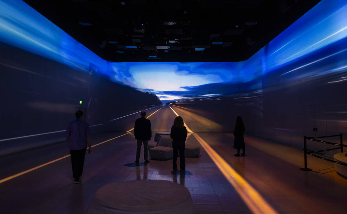 People take in a preview of “Rolling Stone Presents: Amplified, The Immersive Rock Exper ...