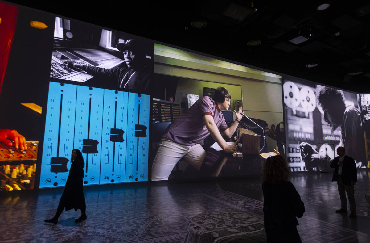 People take in a preview of “Rolling Stone Presents: Amplified, The Immersive Rock Exper ...