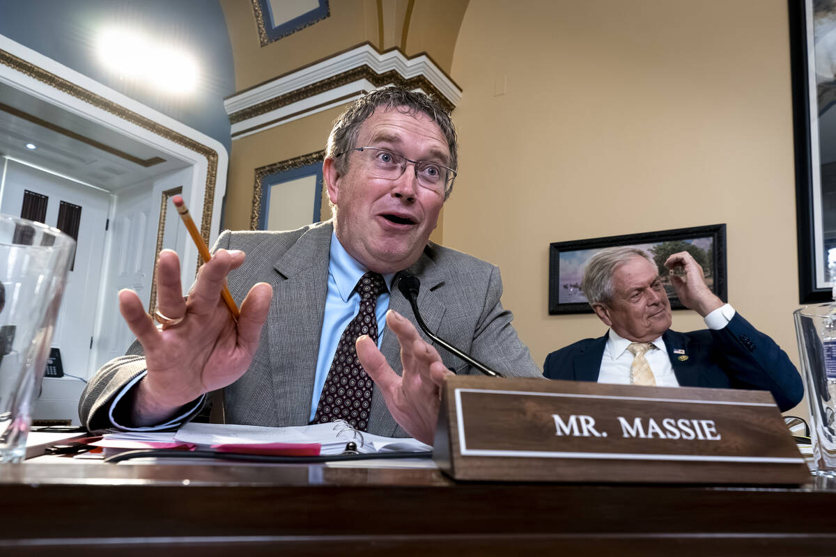 Rep. Thomas Massie, R-Ky., joined at right by Rep. Ralph Norman, R-S.C., both members of the co ...