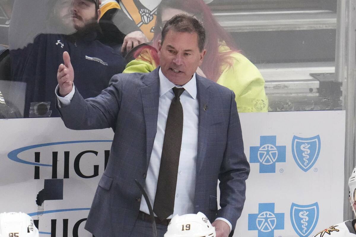Vegas Golden Knights head coach Bruce Cassidy stands behind his bench during the third period o ...