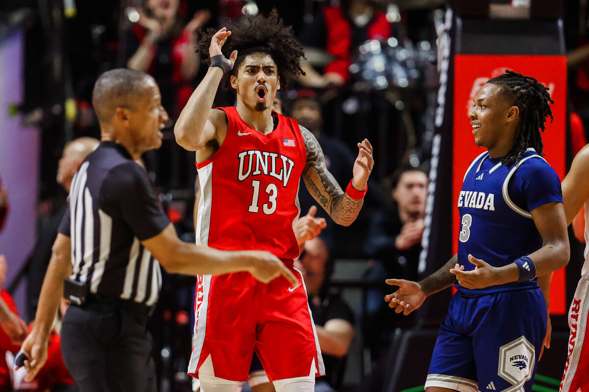 Rebels guard Brooklyn Hicks (13) reacts to a call by a referee during an NCAA men’s bask ...