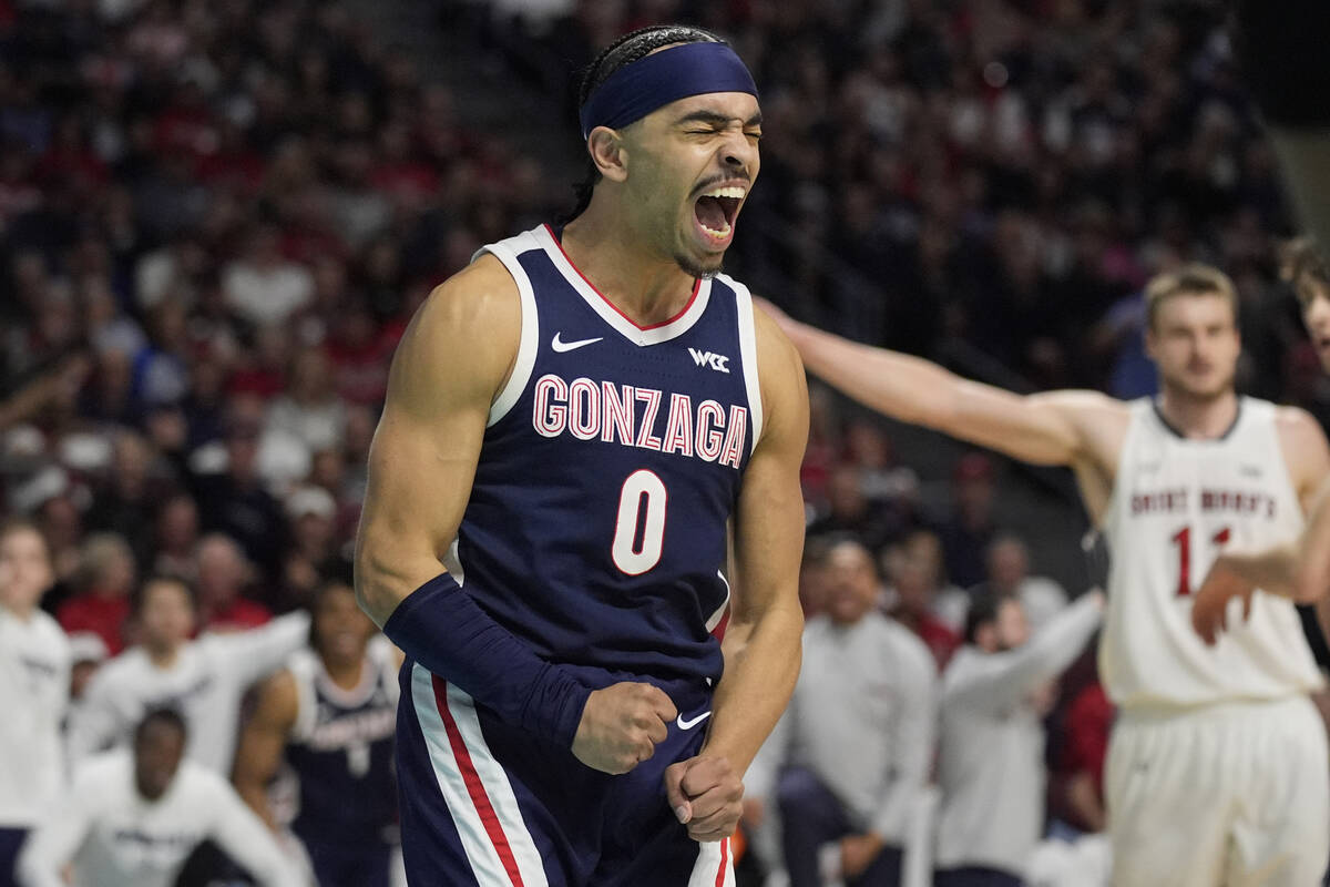 Gonzaga guard Ryan Nembhard (0) celebrates after a play against Saint Mary's during the first h ...