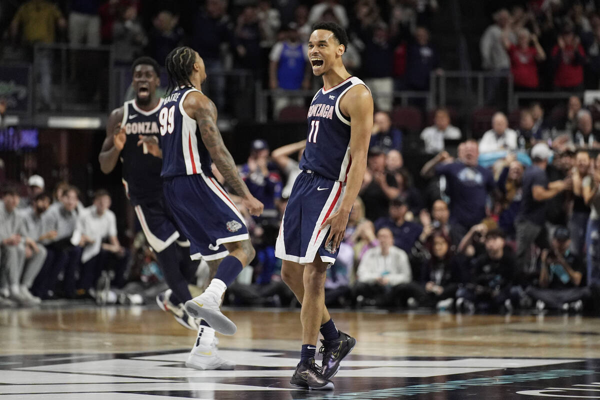 Gonzaga guard Nolan Hickman (11) celebrates as his team leads Saint Mary's during the second ha ...