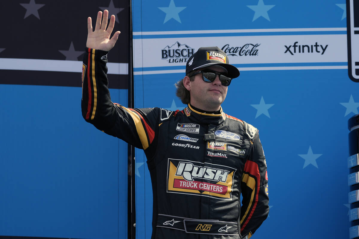Noah Gragson waves during driver introductions before the NASCAR Daytona 500 auto race at Dayto ...